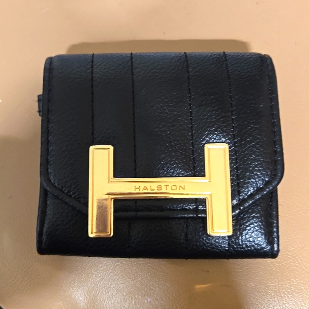 Halston Heritage change purse. Black and gold coloring.